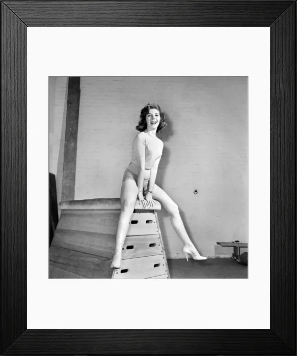 Framed Print : Jean Ryder seen here exercising on a wooden horse. 1959 Framed Print : Jean Ryder seen here exercising on a wooden horse. 1959