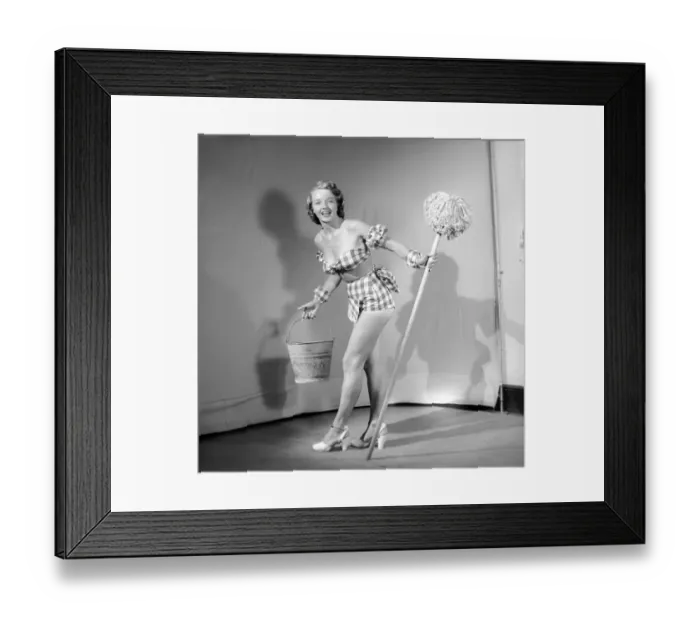 Framed Print : Cleaner wearing fancy dress. 1966 E25-011