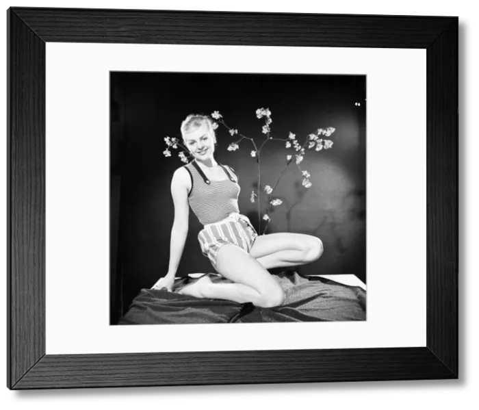 Framed Print : Ruth Calvert seen here modelling the latest 1959 springtime fashions posing with blossom Framed Print : Ruth Calvert seen here modelling the latest 1959 springtime fashions posing with blossom