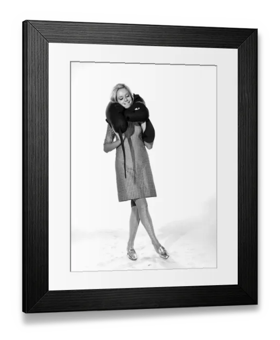 Framed Print : Model Anna Maria Greaves with Roly dog soft toy and draft excluder. 1959 D169-009 Framed Print : Model Anna Maria Greaves with Roly dog soft toy and draft excluder. 1959 D169-009
