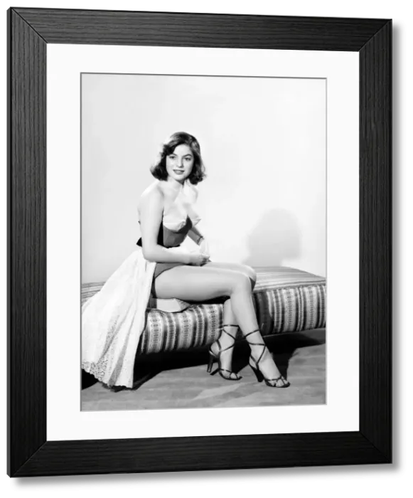 Framed Print : Model showing off tights and suspenders. 1966 Framed Print : Model showing off tights and suspenders. 1966