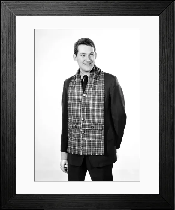 Framed Print : Clothing: Fashion: Menswear: Man wearing tartan muffler. Model: Michael Lester