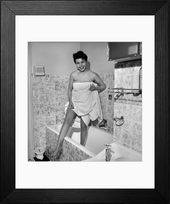 Framed Print : Domestic Life: Woman getting out of bath. 1957 Framed Print : Domestic Life: Woman getting out of bath. 1957