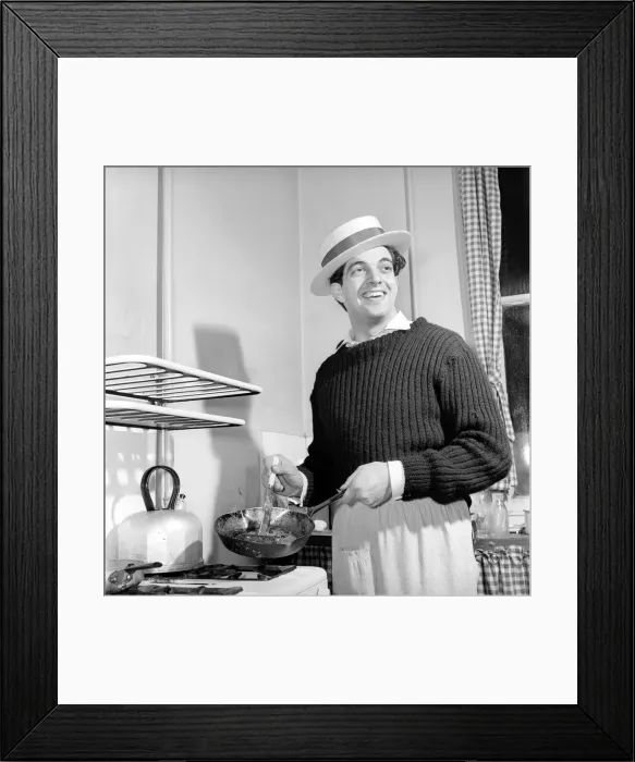 Framed Print : Singer Frankie Vaughan seen here at home cooking breakfast for his family. Circa 1957 Framed Print : Singer Frankie Vaughan seen here at home cooking breakfast for his family. Circa 1957