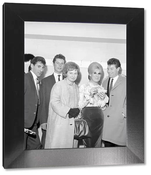 Singer Dusty Springfield seen here signing autographs. Circa 1962