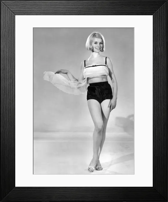 Framed Print : Model Vyvyan Dunbar wearing swimwear top and shorts. July 1965 P007738