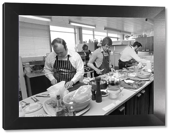 Britains top man in the kitchen competition. Three chefs preparing their dishes