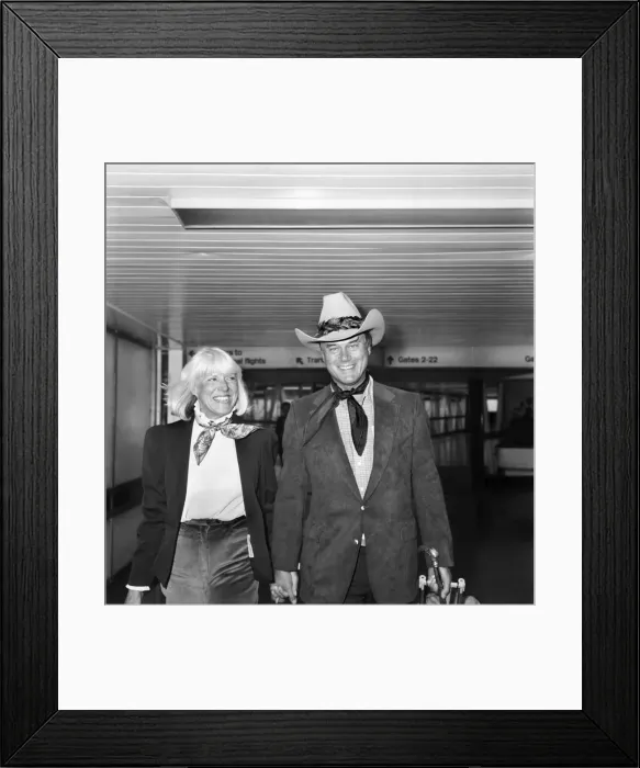 Framed Print : Actor Larry Hagman, Dallass J. R. Ewing, and his wife Maj arrive at London Framed Print : Actor Larry Hagman, Dallass J. R. Ewing, and his wife Maj arrive at London