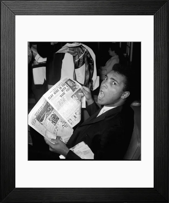 Framed Print : Muhammad Ali - Cassius Clay reading the Daily Mirror Framed Print : Muhammad Ali - Cassius Clay reading the Daily Mirror
