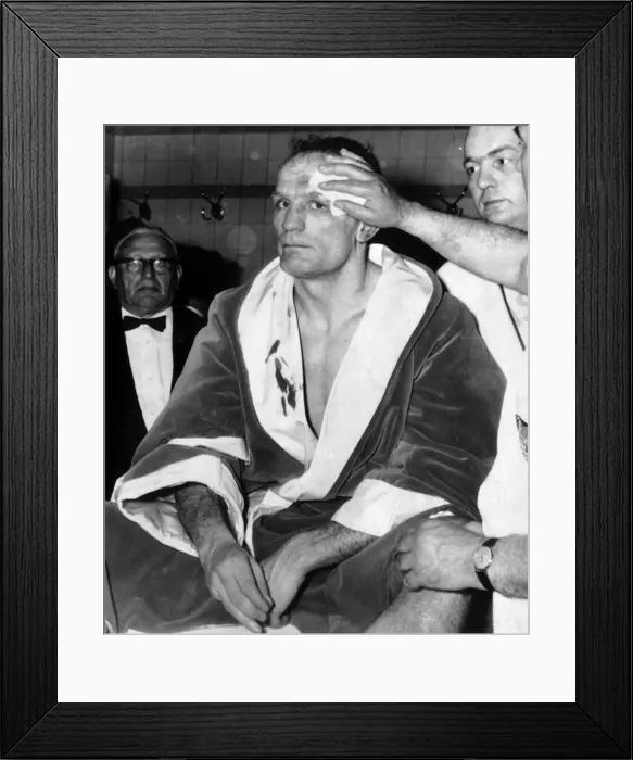 Framed Print : Henry Cooper having his wounds attended to in dressing room May 1966 after the World Framed Print : Henry Cooper having his wounds attended to in dressing room May 1966 after the World