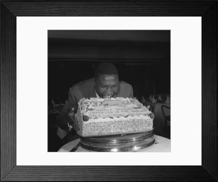 Framed Print : Dick Tiger Middleweight Boxing Champion eating his cake at a West End luncheon Framed Print : Dick Tiger Middleweight Boxing Champion eating his cake at a West End luncheon