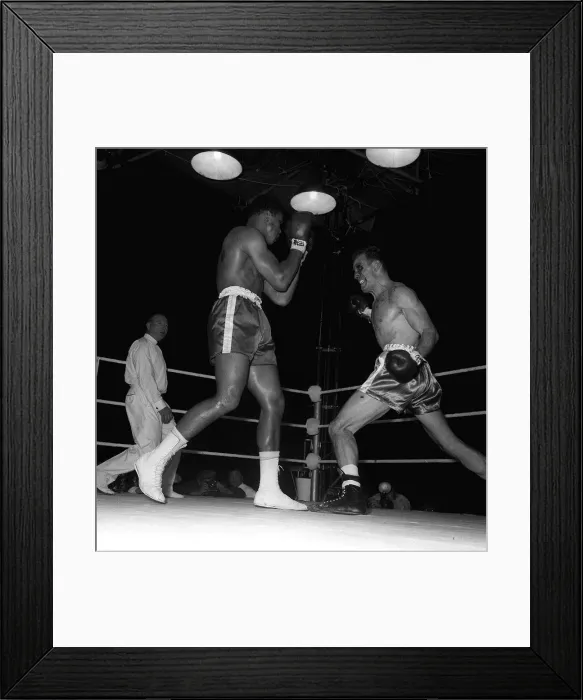 Framed Print : Action during the non-title heavyweight fight between American Cassius Clay Framed Print : Action during the non-title heavyweight fight between American Cassius Clay