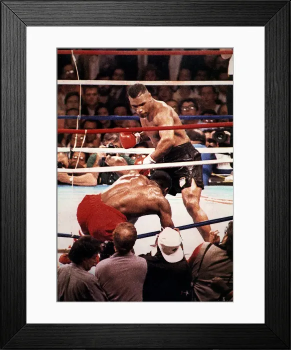 Framed Print : Mike Tyson Heavyweight Boxer stands over the hunched figure of Frank Bruno after knocking Framed Print : Mike Tyson Heavyweight Boxer stands over the hunched figure of Frank Bruno after knocking