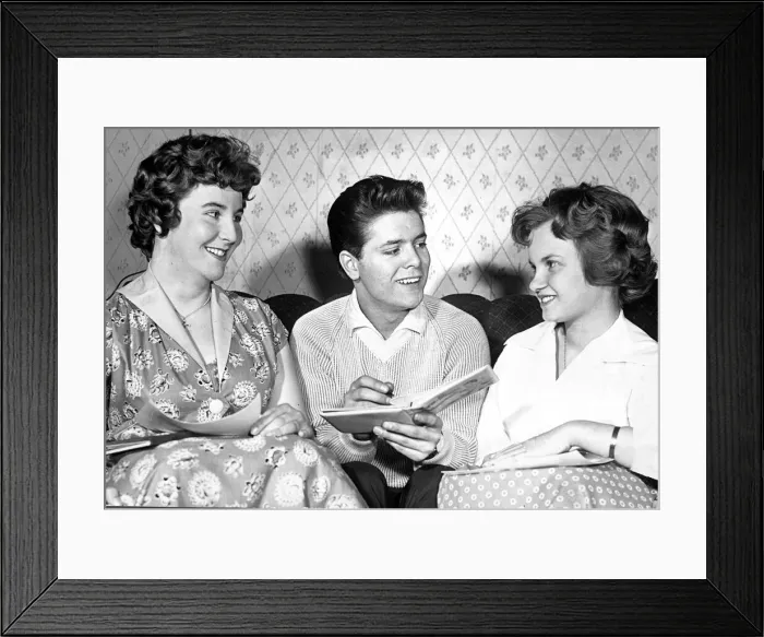 Framed Print : Cliff Richard, pictured with two of his fans, backstage at the Coventry Theatre