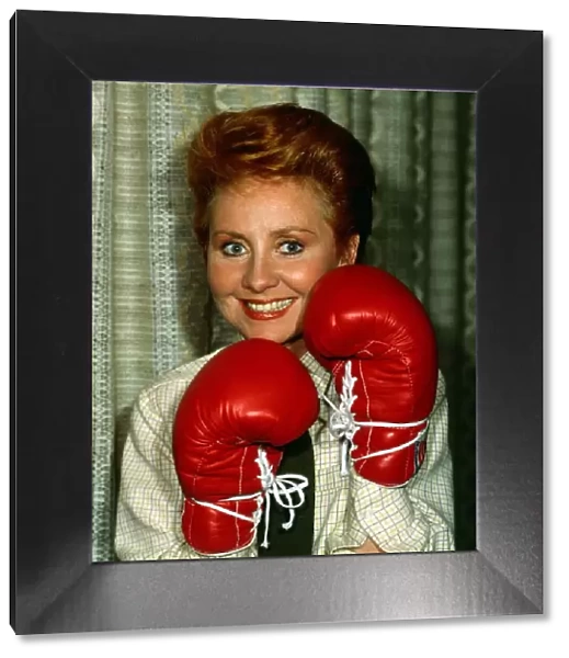Lulu wearing boxing gloves February 1982