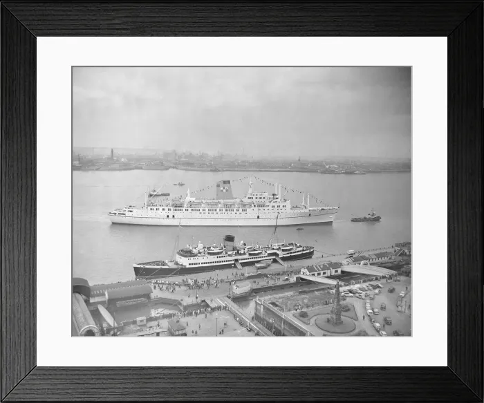 Framed Print : The Empress of Canada seen here being towed to the quayside on the River Mersey Framed Print : The Empress of Canada seen here being towed to the quayside on the River Mersey