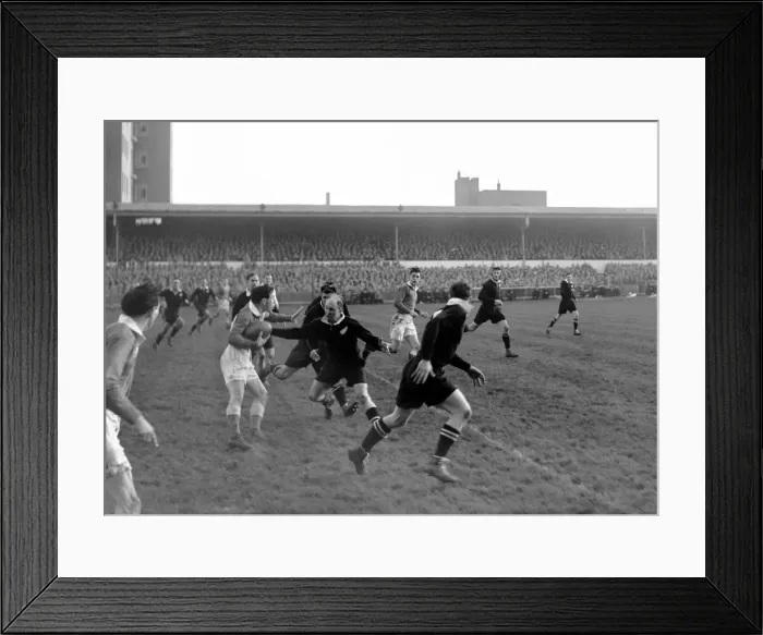 Framed Print : New Zealand full back Bob Scott attempts to tackle the Welsh attack at Cardiff Arms Park Framed Print : New Zealand full back Bob Scott attempts to tackle the Welsh attack at Cardiff Arms Park
