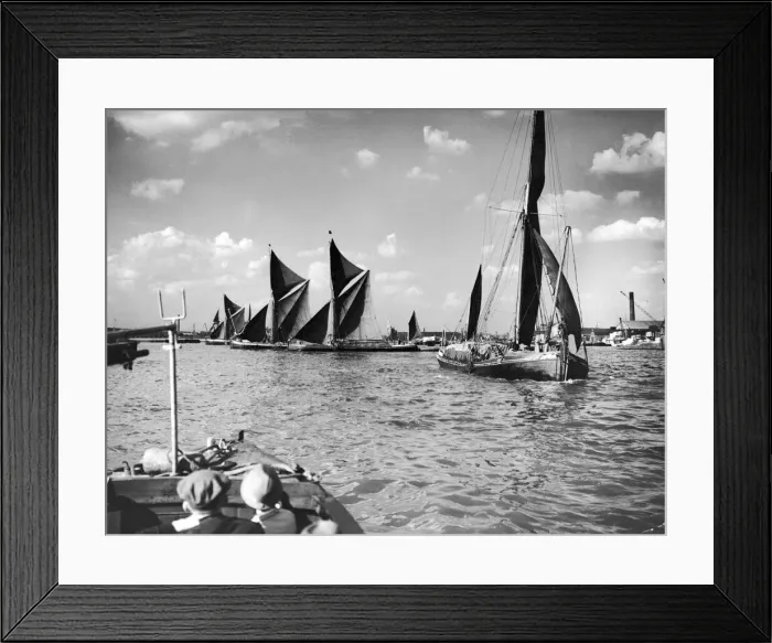 Framed Print : A busy scene on the River Thames where an unusual number of barges realeased from Framed Print : A busy scene on the River Thames where an unusual number of barges realeased from