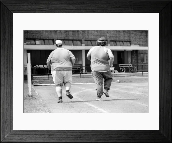 Framed Print : Jogger-nauts: John Robinson sports writer with Colin Taylor jogging in Battersea Park Framed Print : Jogger-nauts: John Robinson sports writer with Colin Taylor jogging in Battersea Park