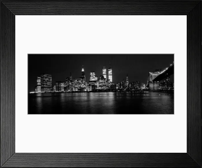 Framed Print : View across the East River of the illuminated Manhattan skyline in New York City