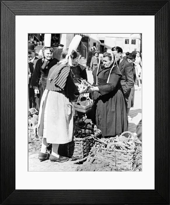 Framed Print : Quimper Britanny France A fishwife sells crabs at a market at Quimper in South Framed Print : Quimper Britanny France A fishwife sells crabs at a market at Quimper in South