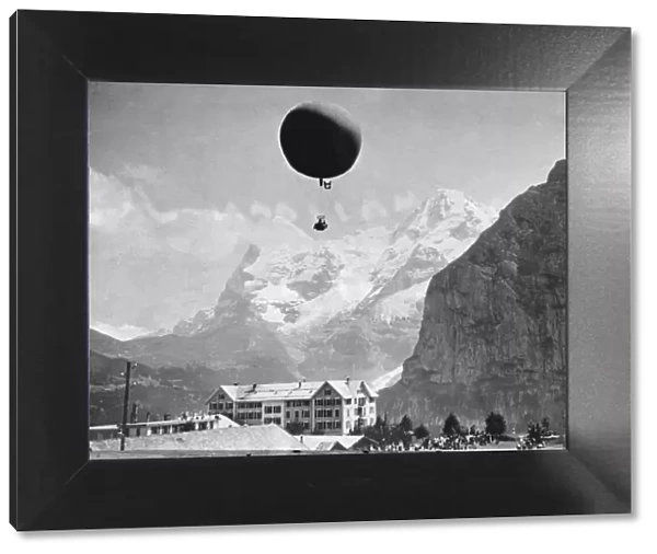 Mr. Console, a Daily Mirror staff photographer flew across the Alps in a balloon in