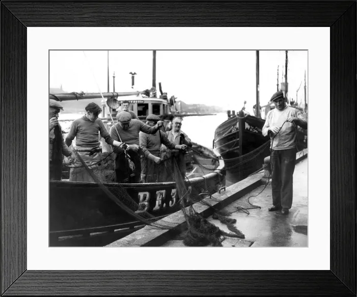 Framed Print : Fishermen of the Scottish herring boat Loranthus sort out their torn nets on North Framed Print : Fishermen of the Scottish herring boat Loranthus sort out their torn nets on North
