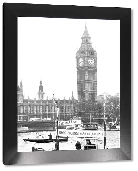 One of the protesting Little Ships gets in the shadow of Big Ben during a