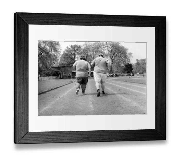 Framed Print : Jogger-nauts: John Robinson sports writer with Colin Taylor jogging in Battersea Park