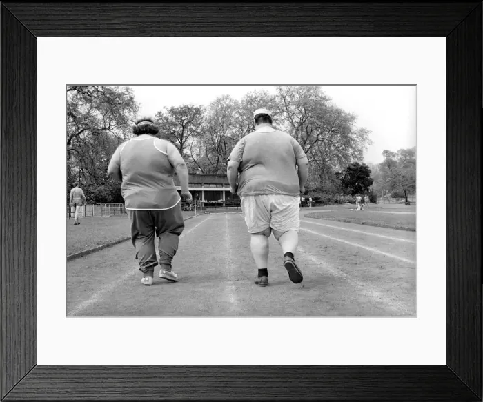 Framed Print : Jogger-nauts: John Robinson sports writer with Colin Taylor jogging in Battersea Park Framed Print : Jogger-nauts: John Robinson sports writer with Colin Taylor jogging in Battersea Park