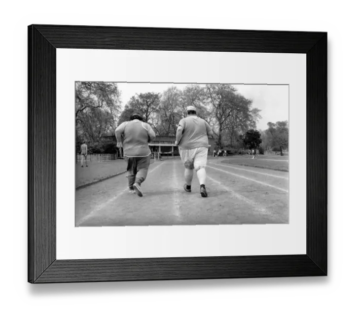 Framed Print : Jogger-nauts: John Robinson sports writer with Colin Taylor jogging in Battersea Park Framed Print : Jogger-nauts: John Robinson sports writer with Colin Taylor jogging in Battersea Park