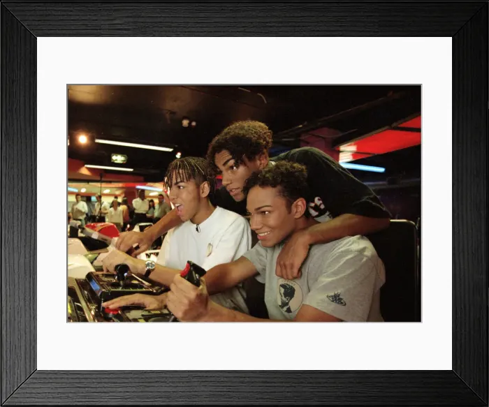 Framed Print : American boy band 3T playing video games at an Arcade 9th September 1996 Framed Print : American boy band 3T playing video games at an Arcade 9th September 1996
