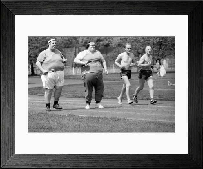 Framed Print : Jogger-nauts: John Robinson sports writer with Colin Taylor jogging in Battersea Park