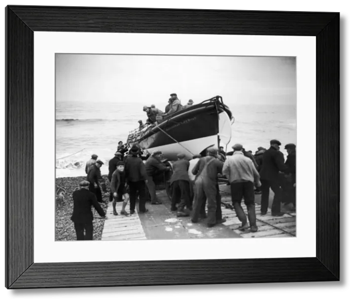 Framed Print : Sheringham lifeboat being launched into the water in Norfolk. Circa 1935