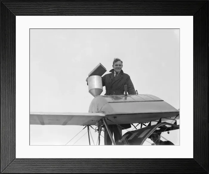 Framed Print : London to Cape Town flight. Mr A. B Elliott filling the fuel tank of Alan Cobham