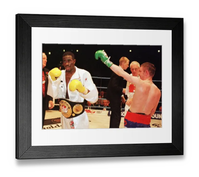 Framed Print : Brian Carr waves to crowds after fight June 1999 Cassius Baloyi forced Brian to