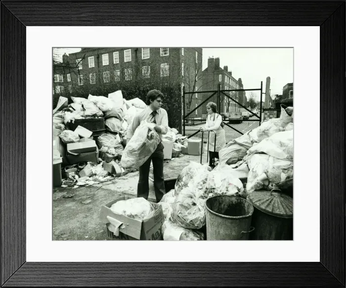 Framed Print : Hospital Staff clear away rubbish at the Queen Elizabeth Childrens Hospital in Hackney