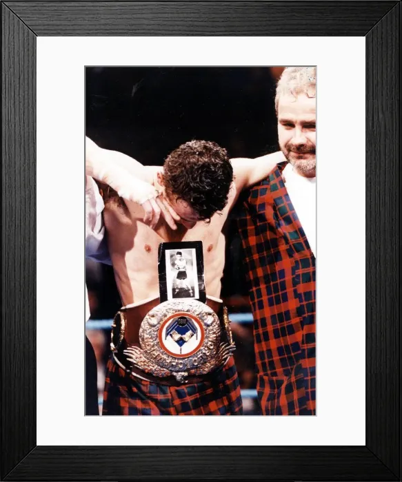 Framed Print : Pat Clinton boxer 1992 WBO flyweight champion Pat Clinton with picture of his late Framed Print : Pat Clinton boxer 1992 WBO flyweight champion Pat Clinton with picture of his late
