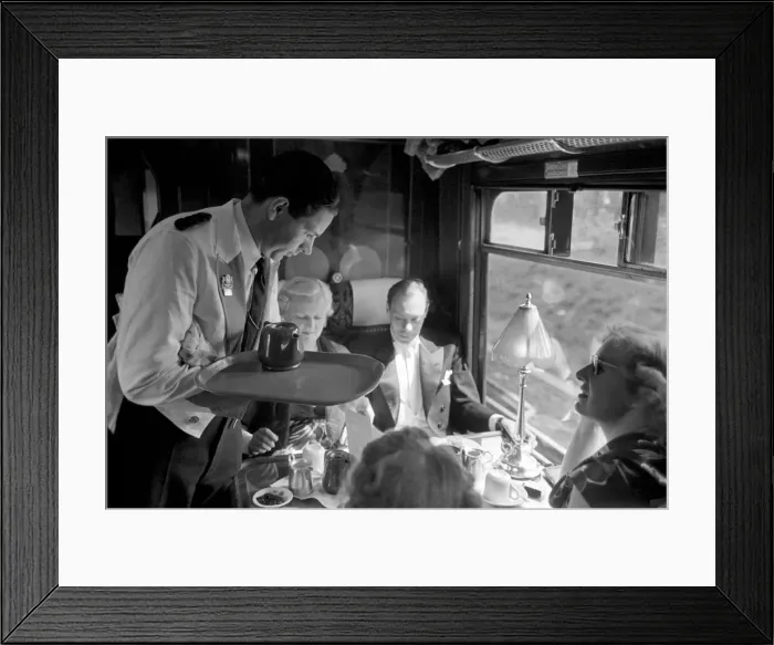 Framed Print : Opera goers express to Glynbourne British Rail waiter serves tea in the Buffet car Framed Print : Opera goers express to Glynbourne British Rail waiter serves tea in the Buffet car