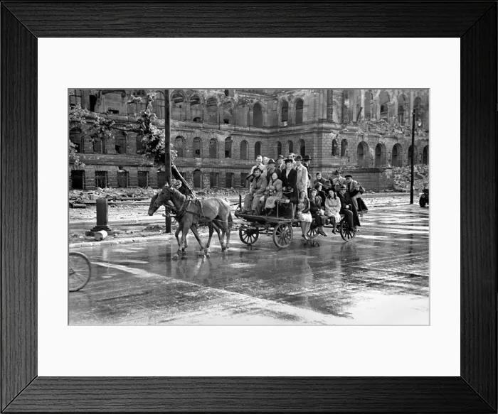 Framed Print : Scenes showing children being pulled along on a horse-drawn cart in the devastated German Framed Print : Scenes showing children being pulled along on a horse-drawn cart in the devastated German