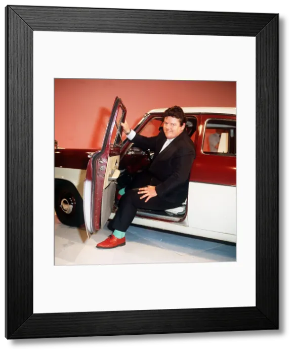 Framed Print : Robbie Coltrane actor pictured in a Mini Circa 1990s Framed Print : Robbie Coltrane actor pictured in a Mini Circa 1990s