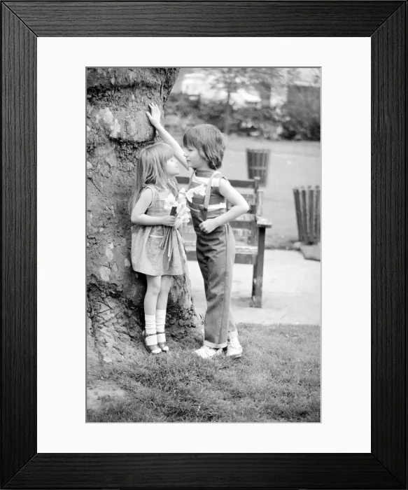 Framed Print : Life can be sweet when you are six and single. Young model Justin Barrett gave five year Framed Print : Life can be sweet when you are six and single. Young model Justin Barrett gave five year