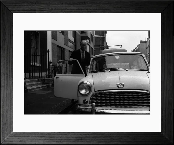 Framed Print : Lord Montagu April 1963 getting into his mini after lunch with Duke of Bedford in Framed Print : Lord Montagu April 1963 getting into his mini after lunch with Duke of Bedford in