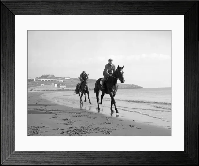 Framed Print : Beating the freeze along the beach at Barry Island, Cheltenham hopefuls Framed Print : Beating the freeze along the beach at Barry Island, Cheltenham hopefuls