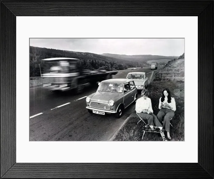 Framed Print : Couple enjoy a picnic on the A74 in Scotland. Roadside Framed Print : Couple enjoy a picnic on the A74 in Scotland. Roadside