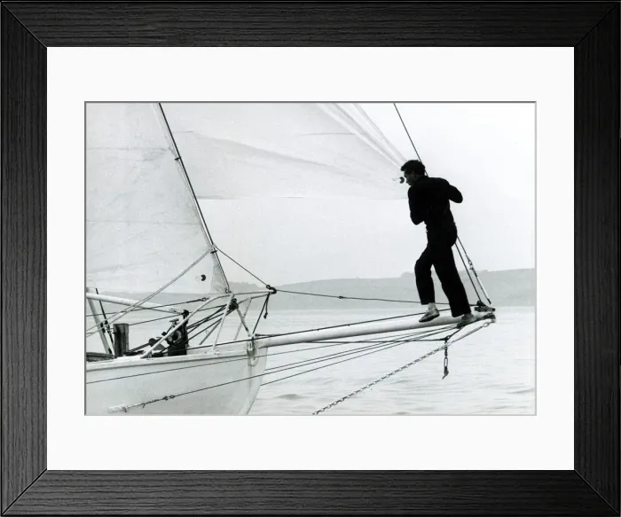 Framed Print : Robin Knox Johnston setting the sails on his Suhaili boat at Falmouth before his