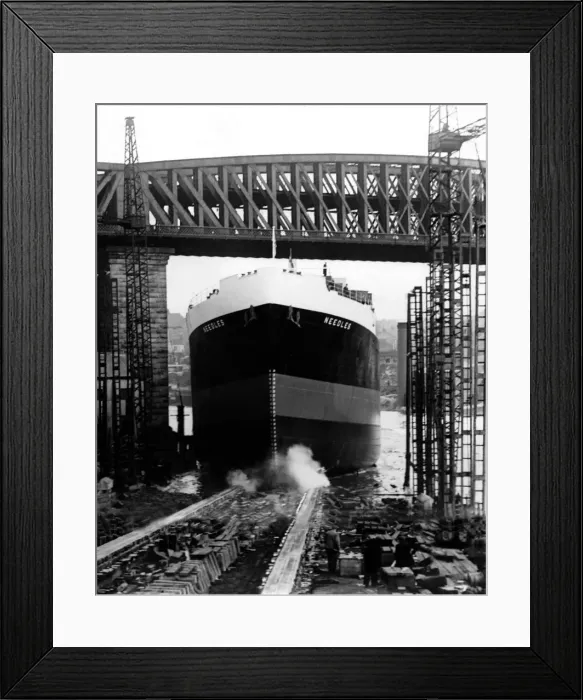 Framed Print : The 9, 200-ton ship Needles moves down the slipway at Austin Framed Print : The 9, 200-ton ship Needles moves down the slipway at Austin