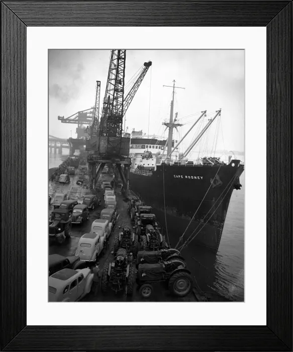 Framed Print : Ford Prefects and Fordson tractors seen here on a Dagenham quayside Framed Print : Ford Prefects and Fordson tractors seen here on a Dagenham quayside