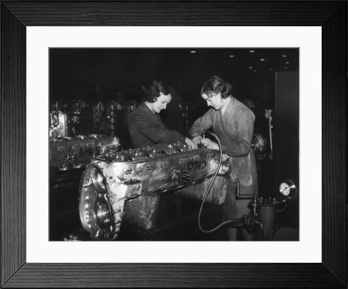 Framed Print : Girls assembling cylinder studs on crank cases of Rolls Royce Merlin engines as they are