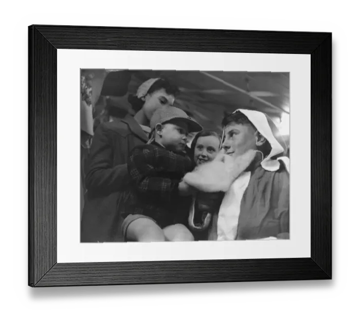 Framed Print : Father Christmas Geoffrey Hall aged 15 seen here at Bushlan Department Store at Stoke Framed Print : Father Christmas Geoffrey Hall aged 15 seen here at Bushlan Department Store at Stoke